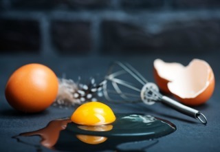 raw chicken eggs on the kitchen table,