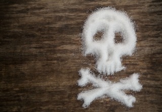 unhealthy white sugar on wooden background concept