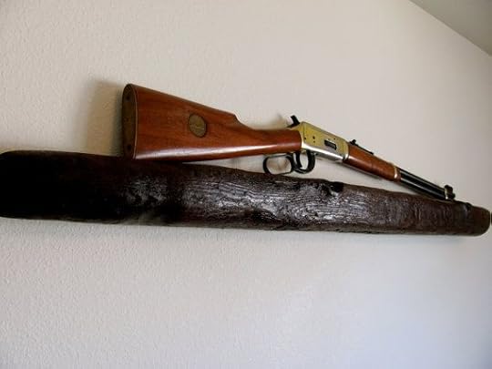 Image result for rifle hanging on the wall