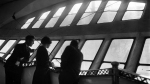 Passengers on the promenade of the R100.