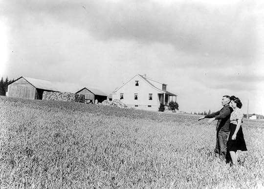 Japanese-American farmer and his daughter on their strawberry farm before being relocated, Bainbridge Island, WA, 23 Mar 1942