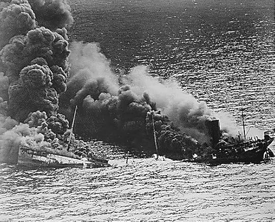 US tanker Dixie Arrow sinking after being torpedoed by German submarine U-71, off North Carolina, 26 Mar 1942 (US National Archives)