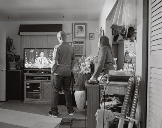 LaToya Ruby Frazier, Denise and Rodney Clay, Shea's aunt and uncle, watch President Obama take a sip of Flint water on television, 2016, from the series Flint is Family Courtesy the artist, Gavin Brown's Enterprise, New York/Rome, and Michel Rein, Paris/Brussels
