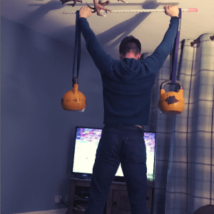 kyle russell using a homemade earthquake bar at home