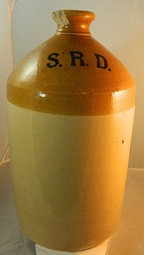 A ceramic or porcelain demijohn held one Imperial gallon (4.5 liters) of rum.
