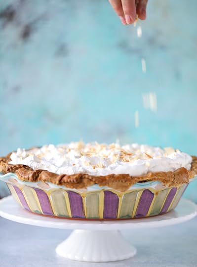 coconut custard pie with coconut whipped cream I howsweeteats.com