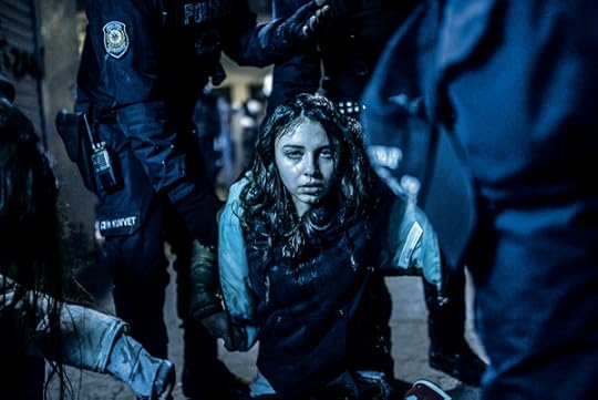 Bülent Kılıç, A young girl wounded with tear gas after the funeral of Berkin Elvan in Istanbul, March 12, 2014 © the artist/AFP/Getty Images