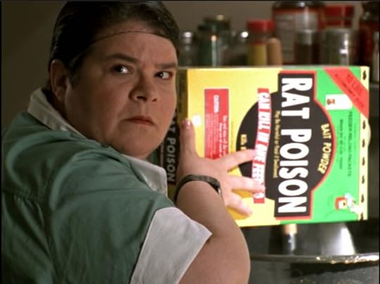 The lunch lady is pouring rat poison into the food.