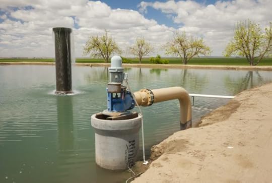 Groundwater pumping and storage system for agriculture, in California's Central Valley (San Joaquin Valley), Fresno County. Photo by