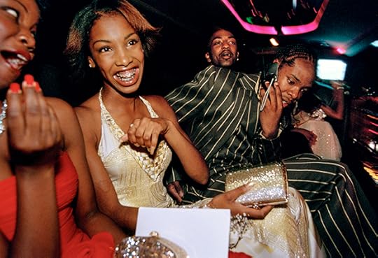 Lauren Greenfield, Crenshaw High School girls selected by a magazine to receive “Oscar treatment” for a prom photo shoot take a limo to the event with their dates, Culver City, California, 2001© the artist and courtesy the Annenberg Space for Photography