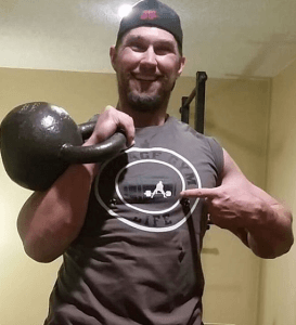SFG Robert Brink in his Garage Gym Life T-shirt after doing mobility work