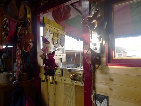 Mr. Punch makes an appearance in Hedgespoken's doorway