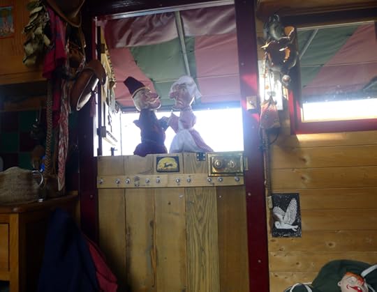 Dame Judy confront the naughty Mr. Punch