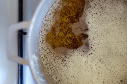 Darkening nutty melted butter, becoming homemade grassfed ghee