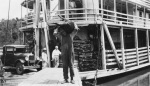 Man unloading a pig