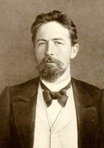Anton Chekov in suit and tie
