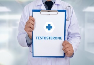 TESTOSTERONE Portrait of a doctor writing a prescription