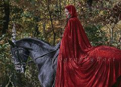 red caped woman on a horse: 