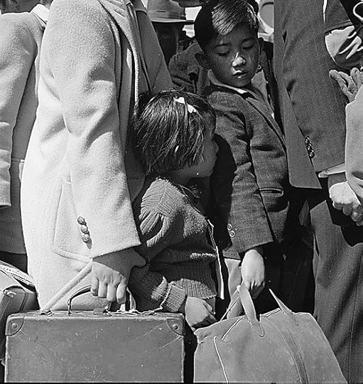 Japanese-American children waiting for bus to take them to an Assembly Center, Byron, CA, 2 May 1942 (US National Archives)