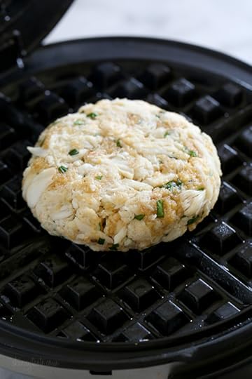 Dust off that waffle machine to make these fast and delicious Waffled Crab Cakes! This is so genius you're going to wonder why you haven't thought of this sooner. The crab cakes cook perfectly in the center, with golden edges in less than 3 minutes! And you get perfect little square pockets to hold the lemon juice or tartar sauce.