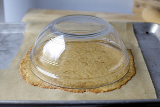 while hot, trim into circle