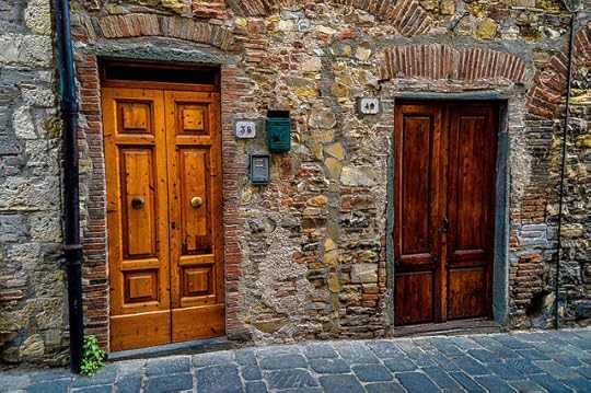 Tuscan doors. From San Donato In Poggio in Pictures: The Beauty of Tuscany