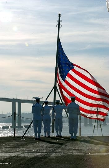 flag at half mast; sailor ssaluting