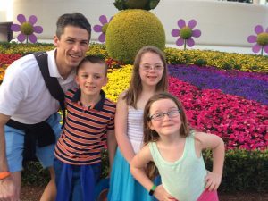 Penny and her family at Epcot, or what love and knowledge together look like