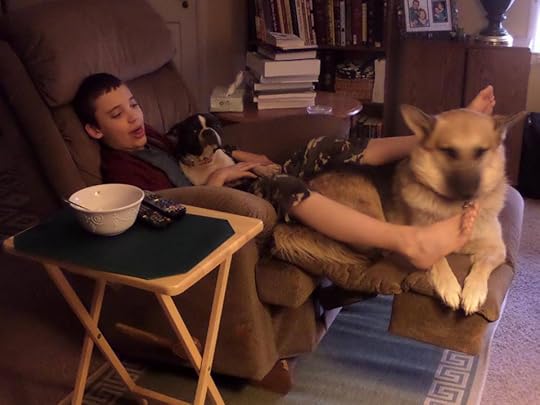 Image may contain: 1 person, sitting, table and indoor