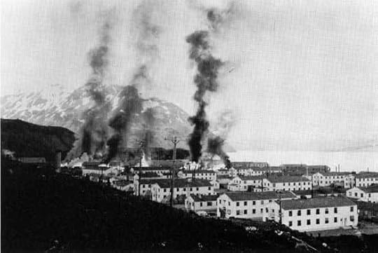 Buildings in Dutch Harbor, Alaska, in flames after Japanese strike, 3 Jun 1942 (public domain via WW2 Database)