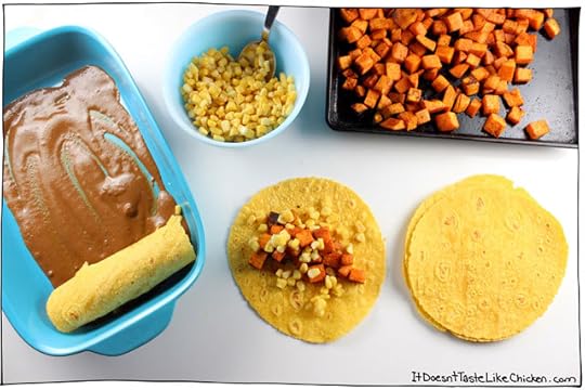 These vegan Sweet Potato & Corn Enchiladas with Mole Sauce are so flavour-packed they will satisfy everyone! Pretty quick and easy to make too. Topped with avocado makes a perfect Mexican inspired weeknight meal. Vegetarian and gluten free #itdoesnttastelikechicken