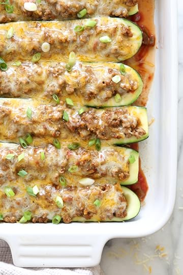 For a low-carb, summer spin on taco night, you'll love these Taco Stuffed Zucchini Boats filled with seasoned ground turkey and topped with a Mexican cheese blend.