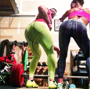 Basma and Jerad Penner clowning around in their garage gym