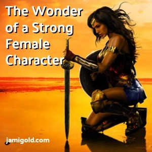 Wonder Woman poster: Silhouette on a beach at sunset with added text: The Wonder of a Strong Female Character