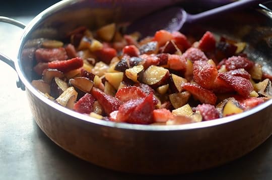 Chopped fruit in the pan for strawberry plum jam