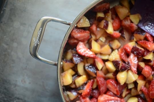 Artfully out of focus fruit for strawberry plum jam