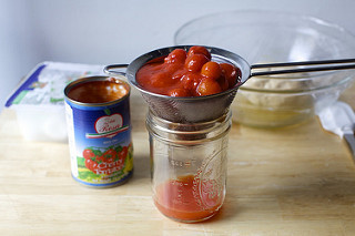 it can help to drain canned tomatoes a little