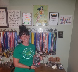 AnnieLori Thompson with her growing trophy collection