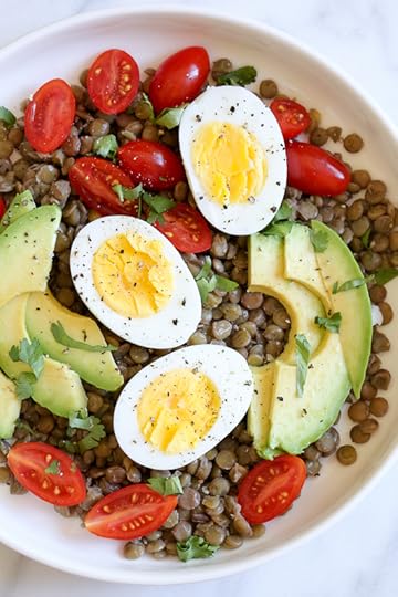 Lentils with hard boiled eggs, tomatoes, avocado, a squeeze of lime juice, cilantro and a few dashes of hot sauce is a really simple meatless lunch I like to make for myself anytime I have cooked lentils (or sometimes I buy them cooked).