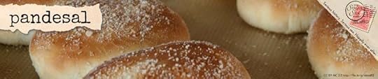pandesal bread sweet food glossary term in Sugar Sun steamy historical romance series by author Jennifer Hallock. Serious history. Serious fun. Happily ever after.