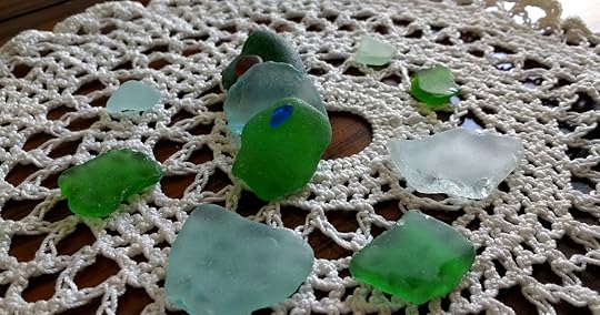 Sea glass in blue, green, and clear shades.