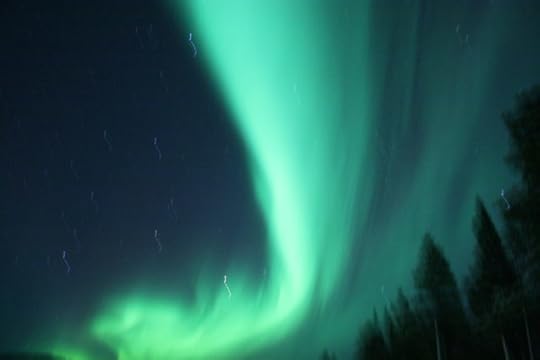 Ribbons of green aurora in Sweden.