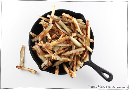 Classic Canadian comfort food: The Ultimate Vegan Poutine. Baked crispy French fries, topped with quick and easy dairy-free cheese curds, smothered in rich onion gravy. #itdoesnttastelikechicken