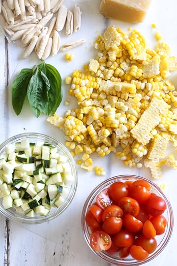 I love this quick, summer pasta dish made with homemade Cavatelli pasta, (can be purchased fresh or frozen in any Italian specialty store) cherry tomatoes, zucchini, corn and marinara. Perfect to whip up on busy weeknights as this dish comes together in less than 20 minutes.