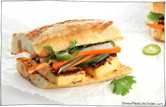 Layers of seasoned grilled tofu, a creamy spicy spread of homemade Sriracha mayonnaise, sweet salty and crunchy pickled veggies piled high, garnished with fresh cilantro and jalapeno, all on top of a soft chewy baguette. ← THIS is the king of sandwiches, and it’s called Grilled Tofu Banh Mi. #itdoesnttastelikechicken