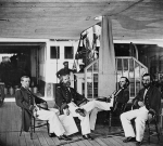 Seated officers on the USS Hunchback, a converted side-wheel civilian ferry.