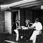 Acting Assistant Paymaster Henry Cushing (in white on right) on board the USS Hunchback