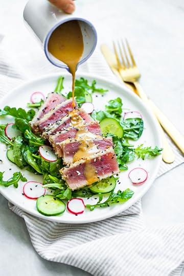 This panko-and-sesame crusted seared tuna on a bed of arugula and spinach, all topped with a wasabi butter sauce, takes Japanese food to whole new level!