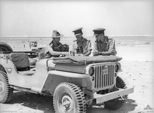 Capt. TI Gellibrand and Lt. JT Cook of the Australian 24th Infantry Brigade HQ, and Lt. ET Pearce near El Alamein, Egypt, 19 Jul 1942 (Australian War Memorial)