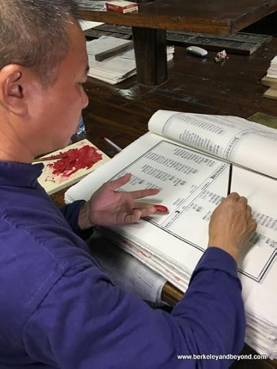 coloring journals in Dongyuan Printing Village in Pingyangkeng Township in Ruian City near Wenzhou, China